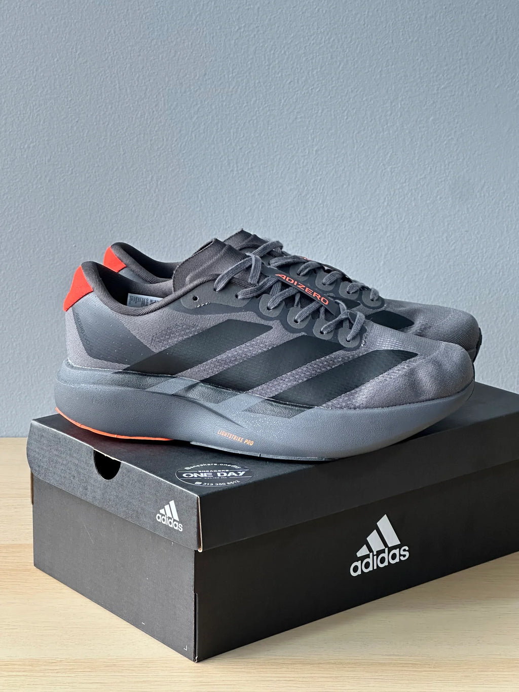 ADIDAS ADIZERO EVO SL GRIS
